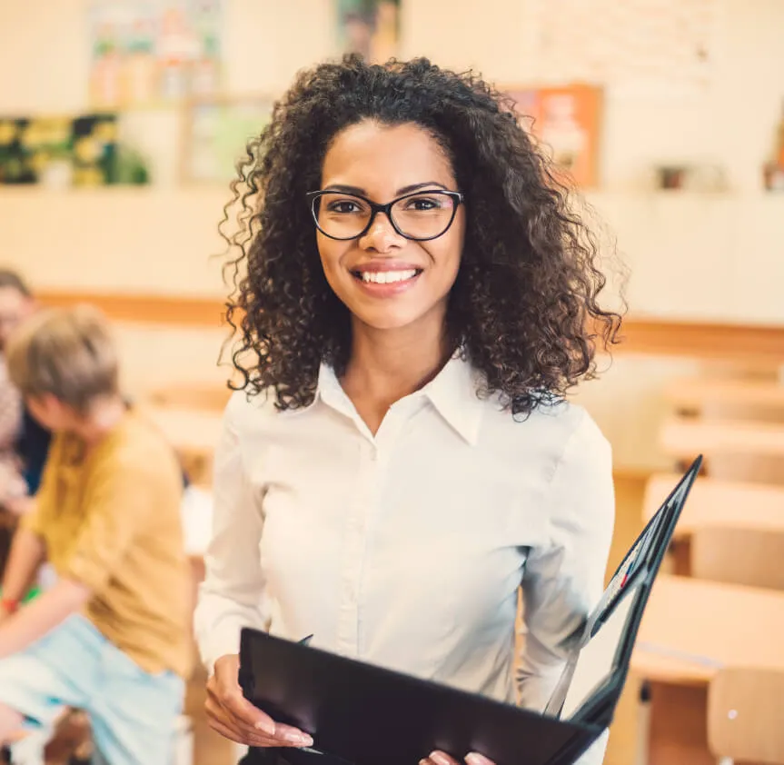 teacher with a classroom planner