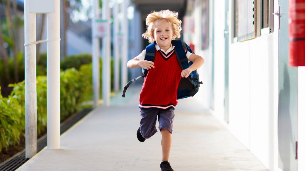 Child running to school