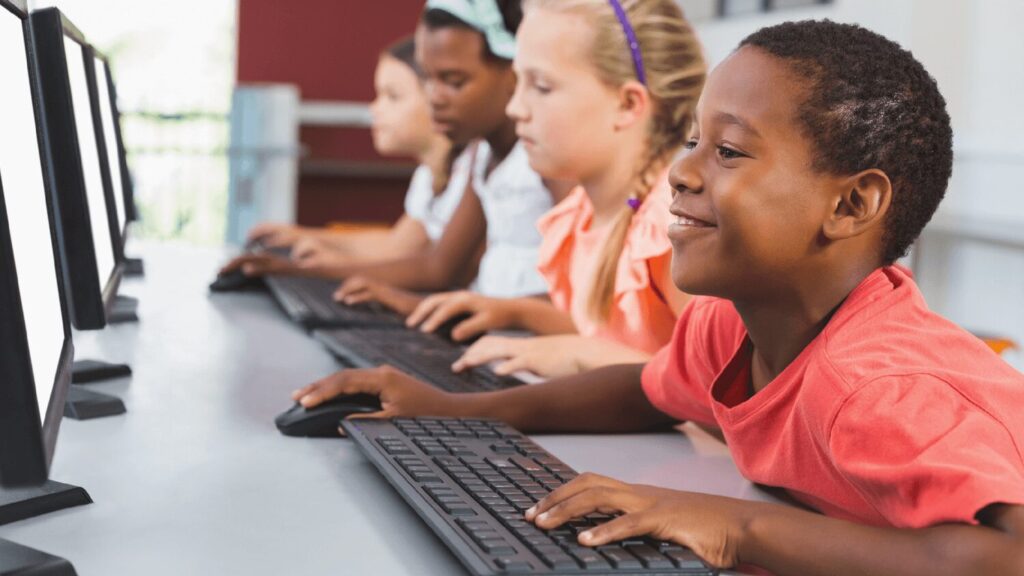 Seesaw students in a computer lab practicing digital safety