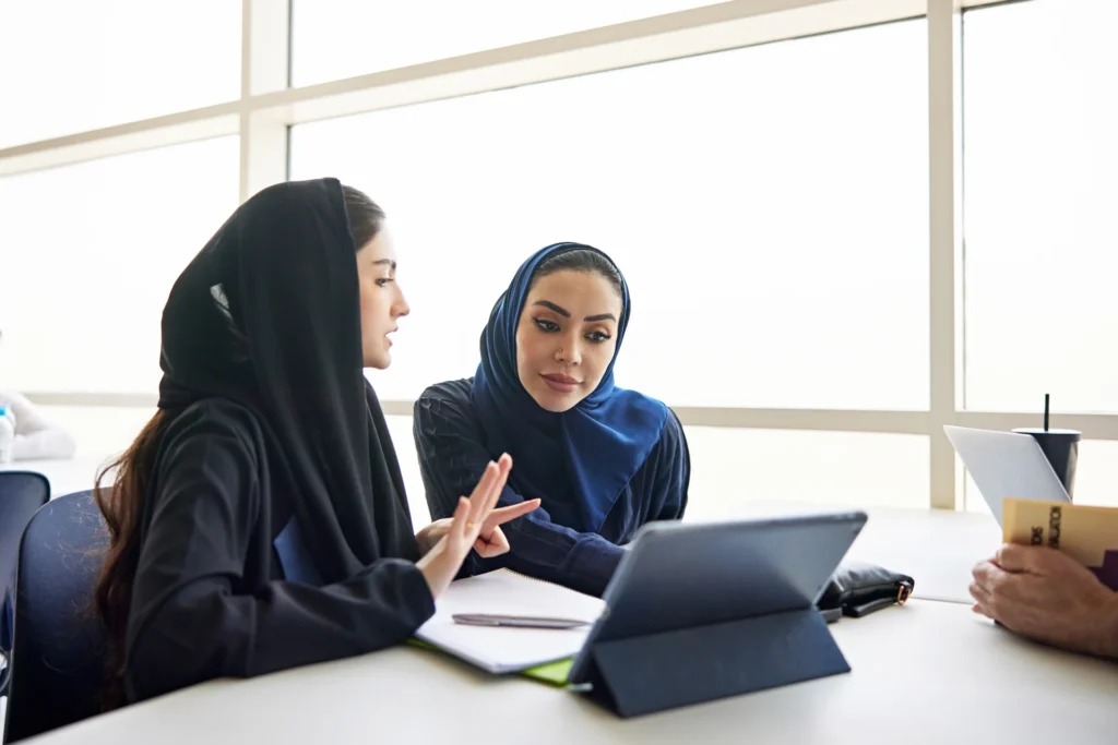 Admins reviewing data on a device